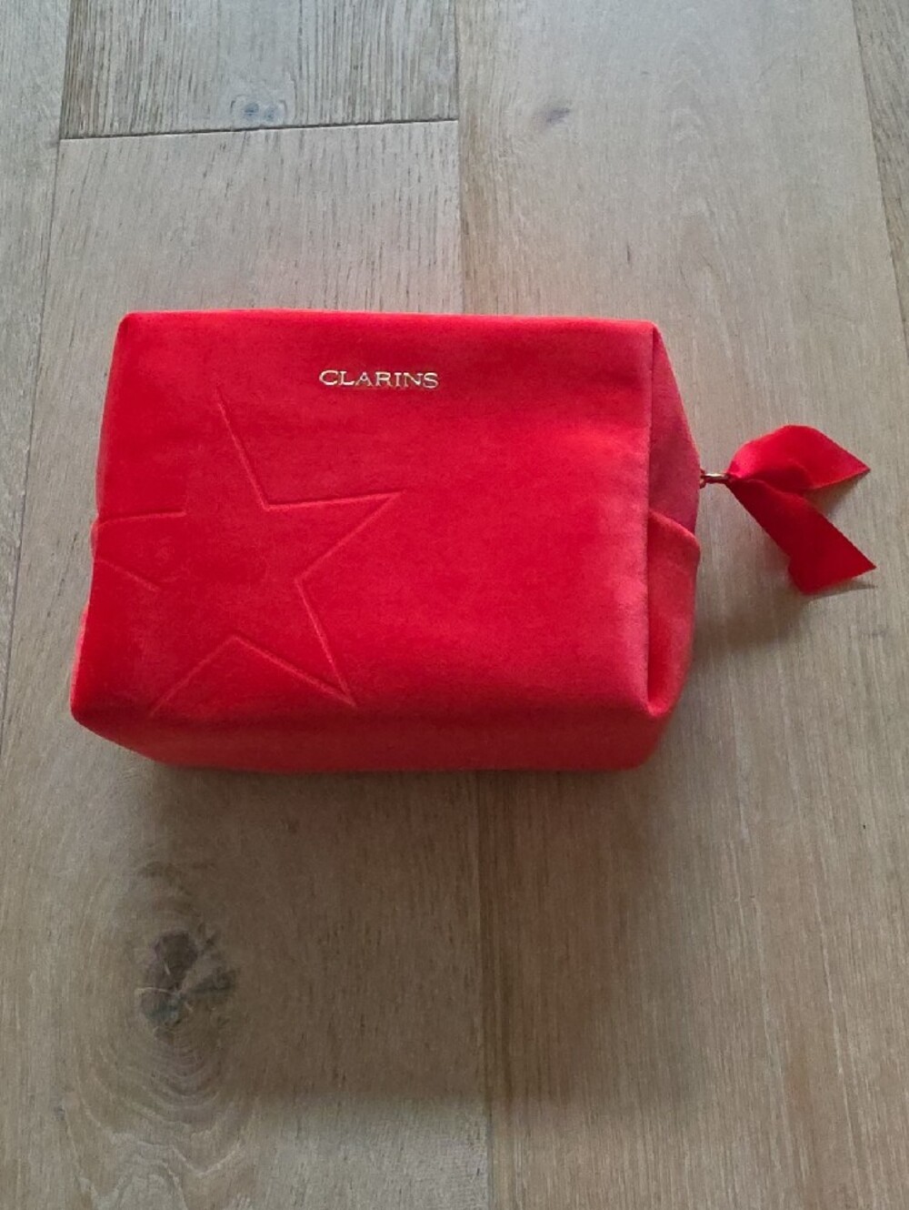 NWOT Clarins Red Velvet 'Star' Toiletry Pouch